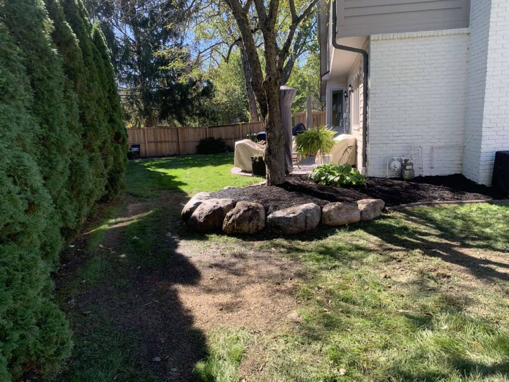 Boulder retaining wall
